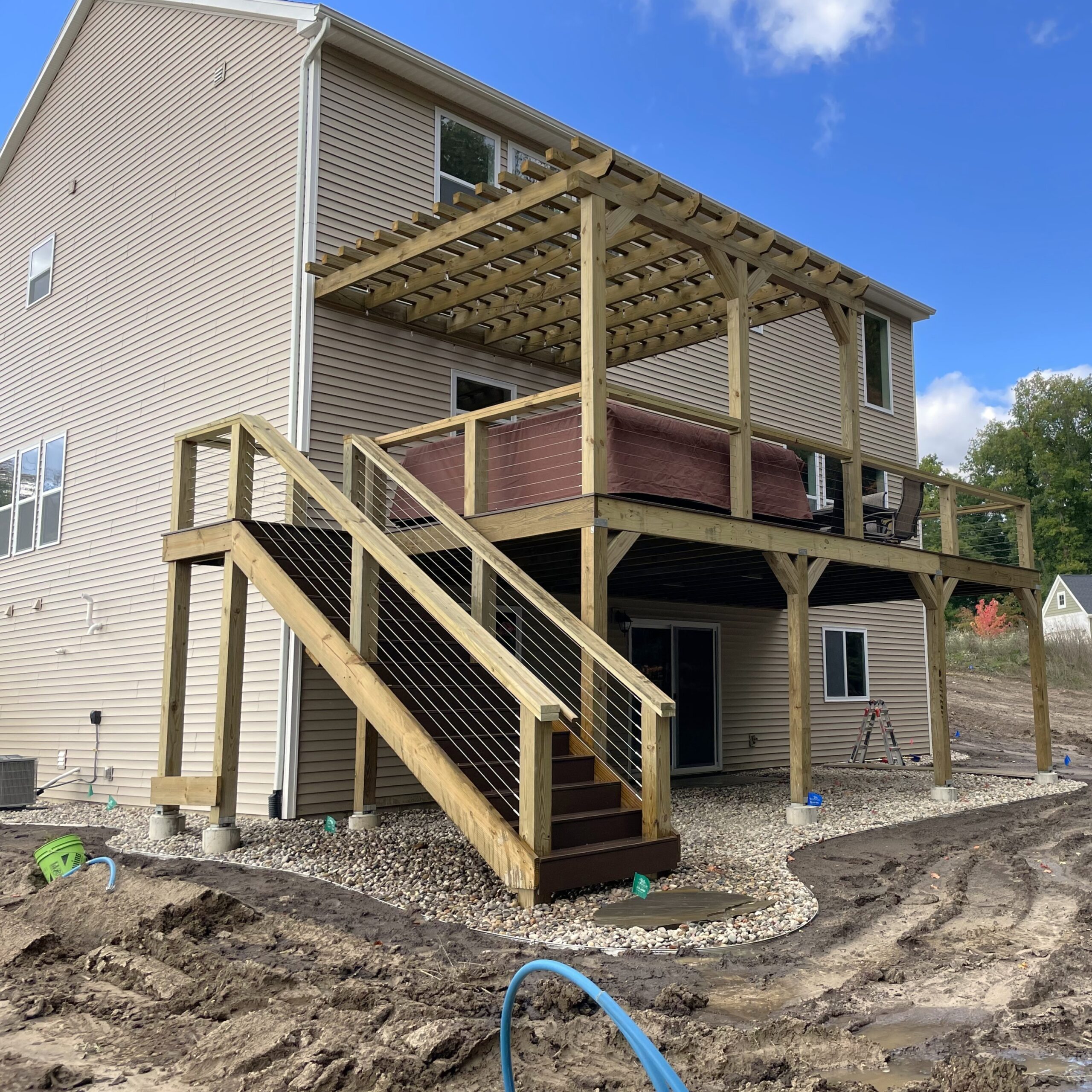 Exterior remodel deck with pergola and composite decking